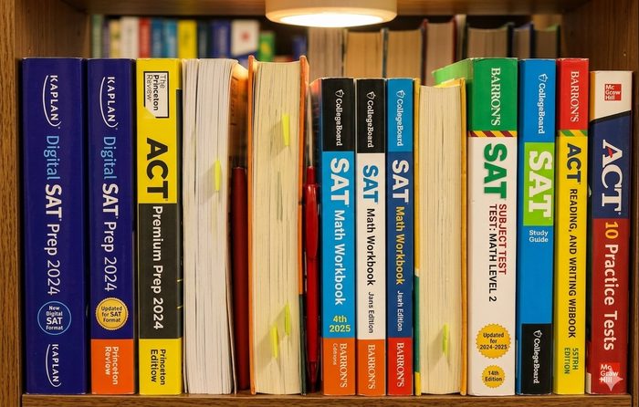 SAT and ACT prep books on a shelf